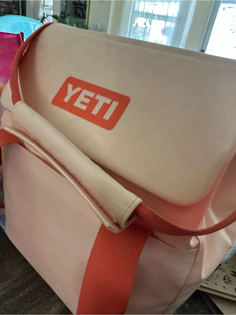 Yeti Pale Pink Backpack with Orange Straps and Yellow Zipper